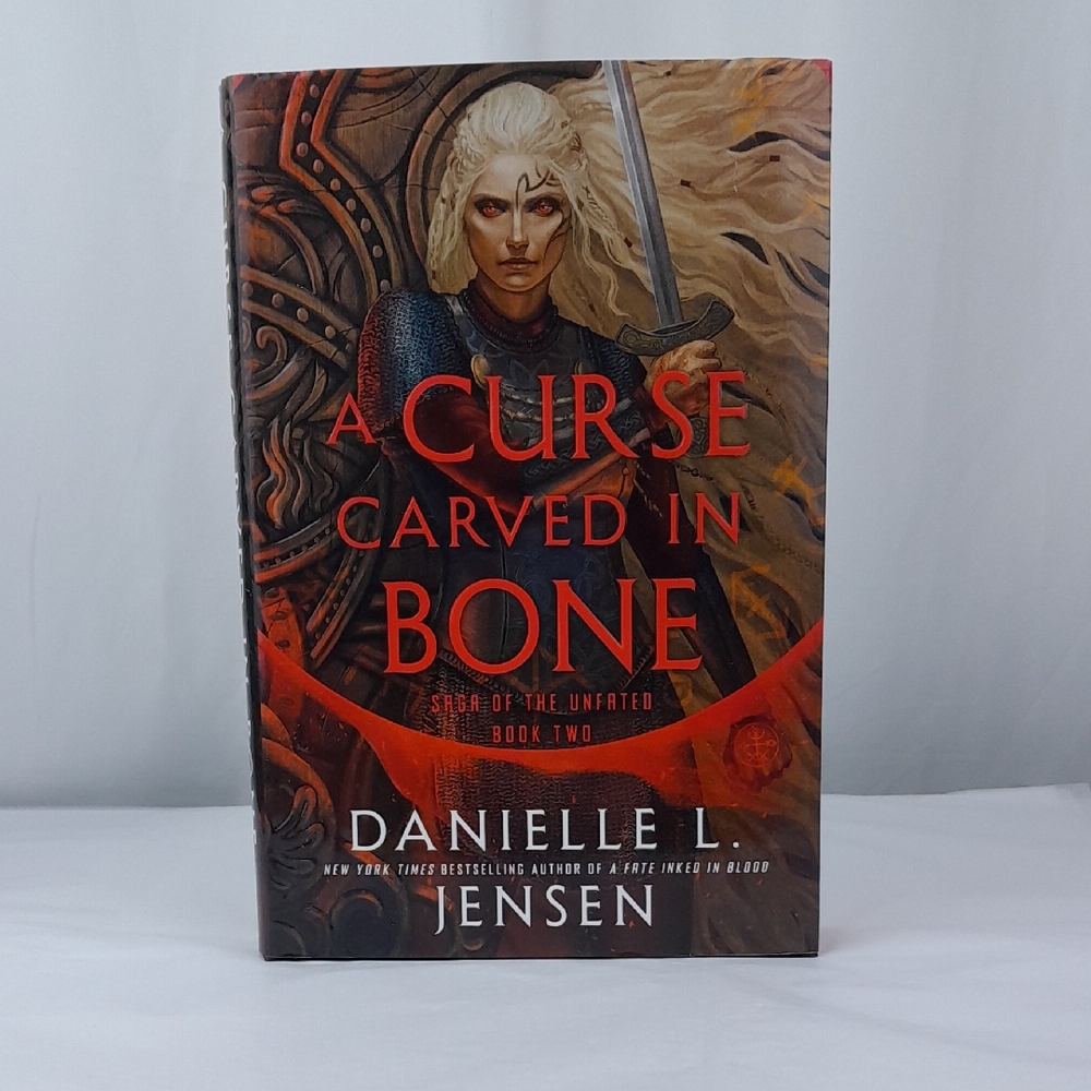 A Curse Carved In Bone By Danielle L. Jensen